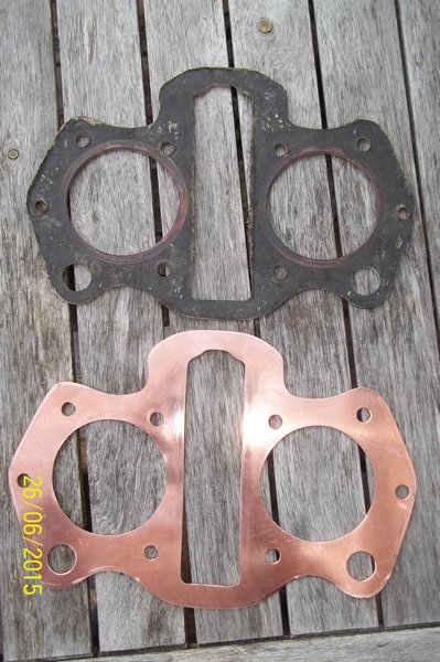 hand fashioned copper head gasket.