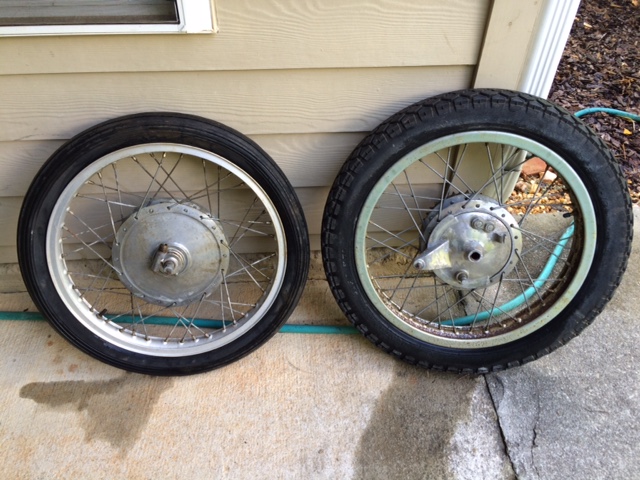 Wheels of bike, front is a dual leading shoe.