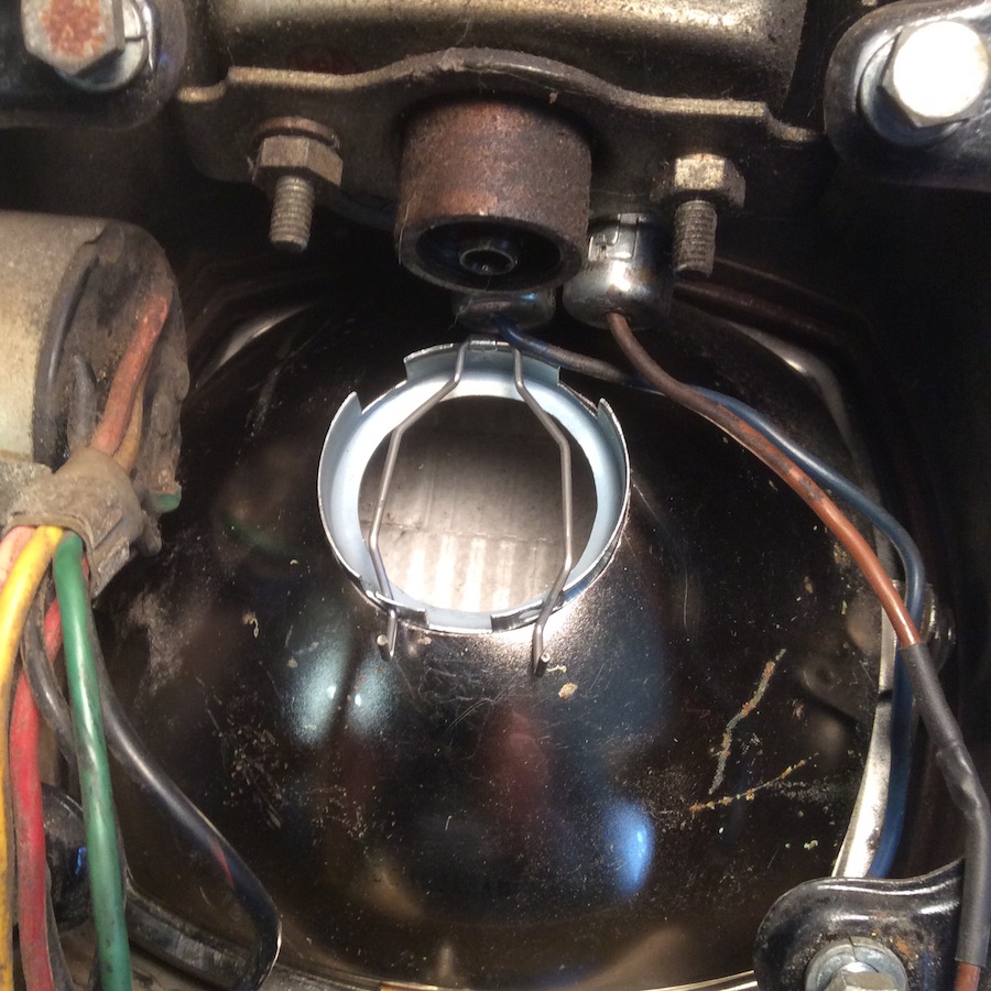 Trial fit of bulb with holder only into the headlight bucket.